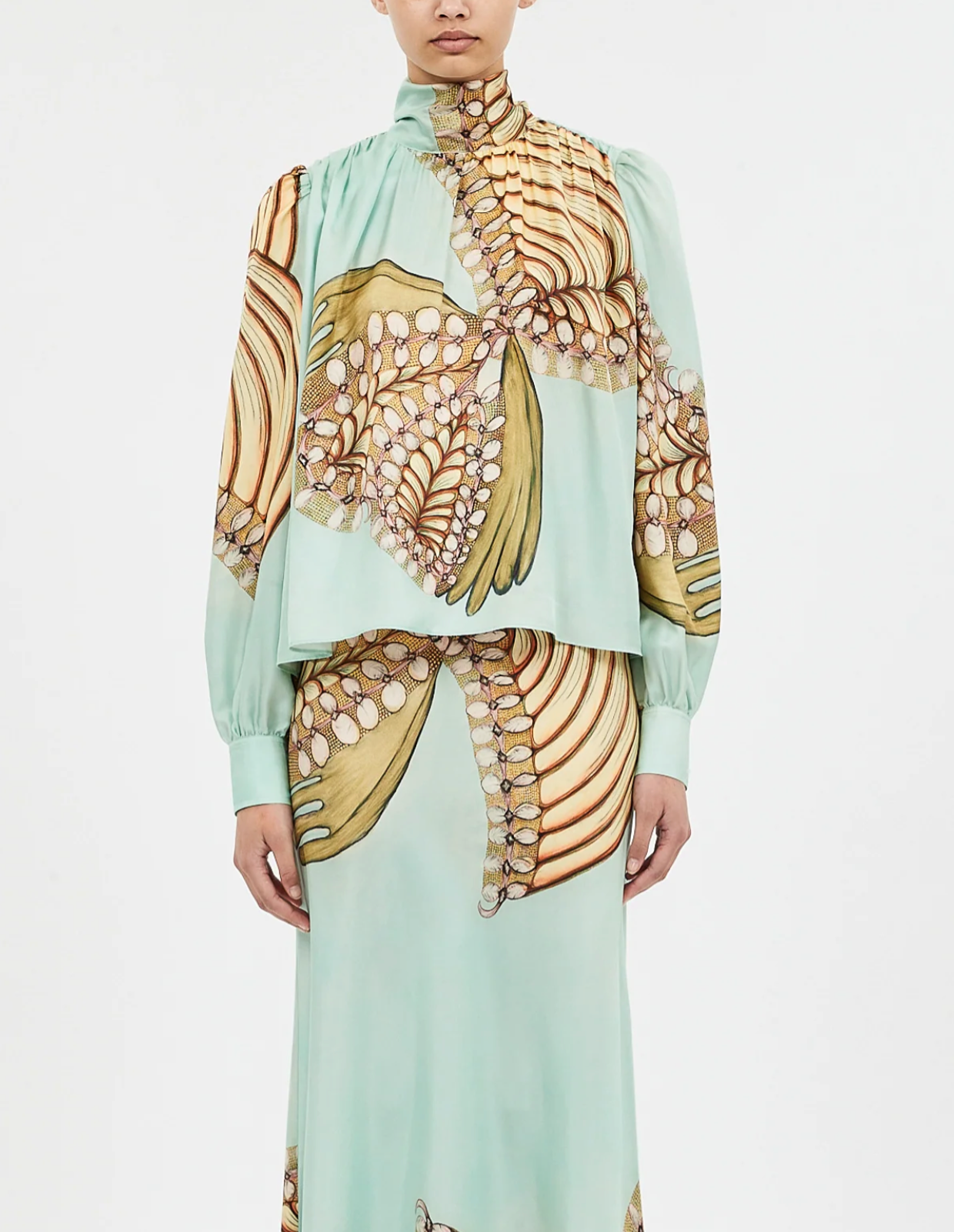 ORNAMENT TIE NECK BLOUSE