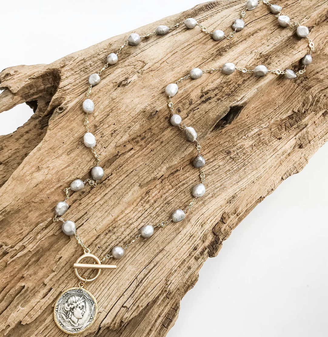 VINTAGE COIN ON 31" PEARL BEZEL ROSARY