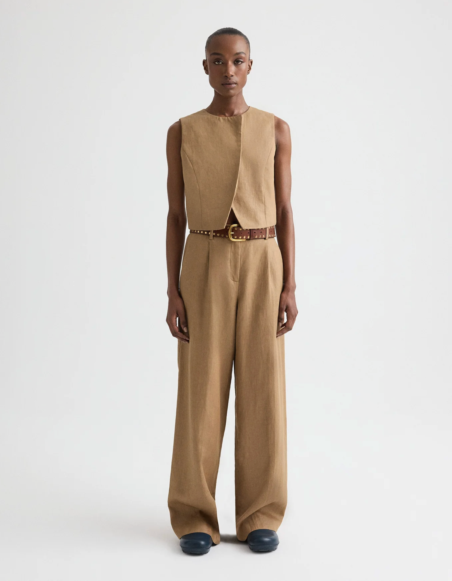 HIGH NECK HIDDEN PLACKET VEST