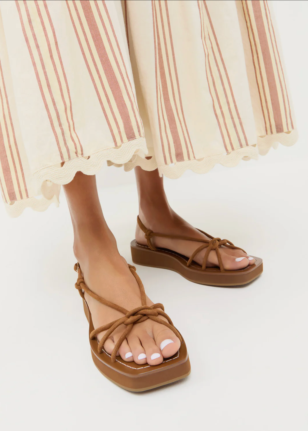 NOMI ELEVATED SANDAL